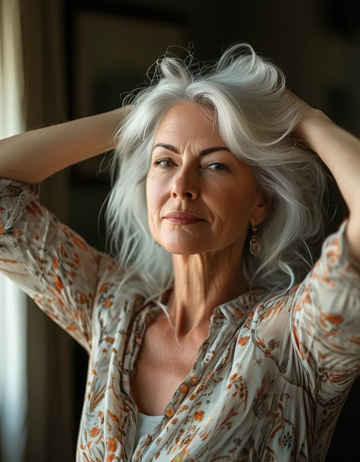 How to Get Through the Awkward Gray Hair Grow-Out Phase Without Cutting It All Off